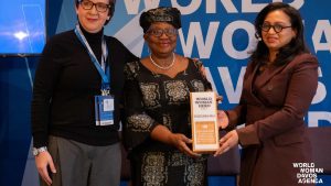 Dr. Ngozi Okonjo-Iweala received the World Woman Hero Award from Rupa Dash, CEO of the World Woman Foundation, and Maria Mikhaylenko, Global Managing Partner at Roland Berger, in recognition of her transformative leadership in global trade and commitment to empowering women worldwide.